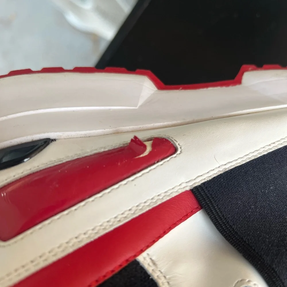 Michael Kors Black and White High-Top Sneakers with Red Accents - Picture 13 of 16